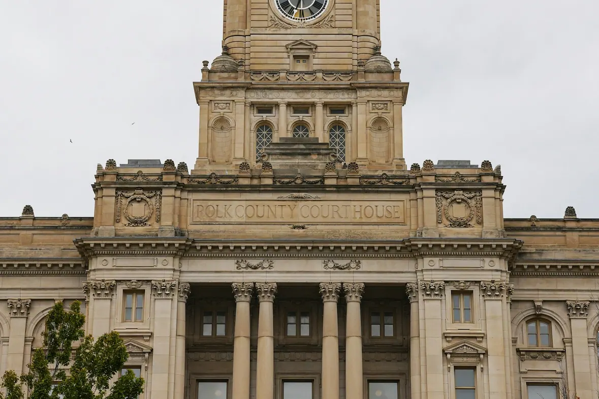 An ornate civic building with a prominent clock tower