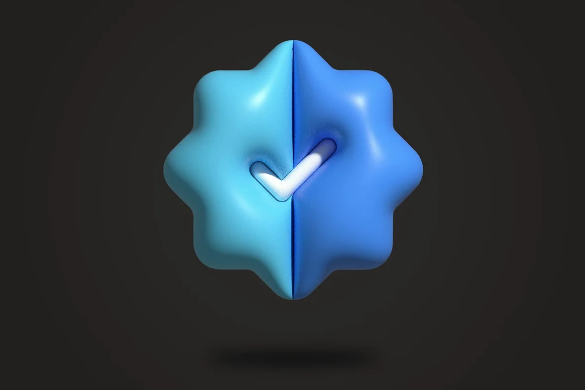 A blue three-dimensional object marked with a check mark