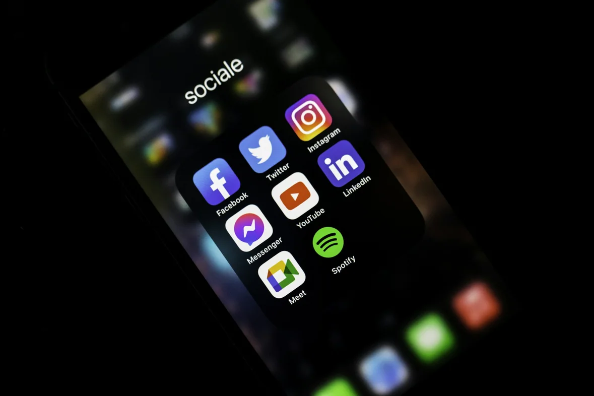 A phone screen displaying a grid of application icons